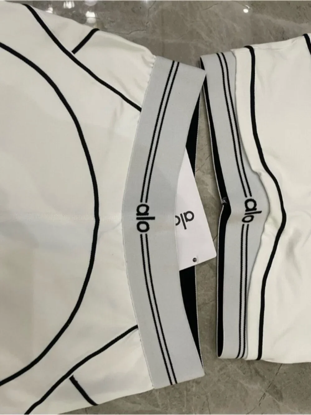 ALO Yoga White High-Rise Leggings with Black Contrast Piping